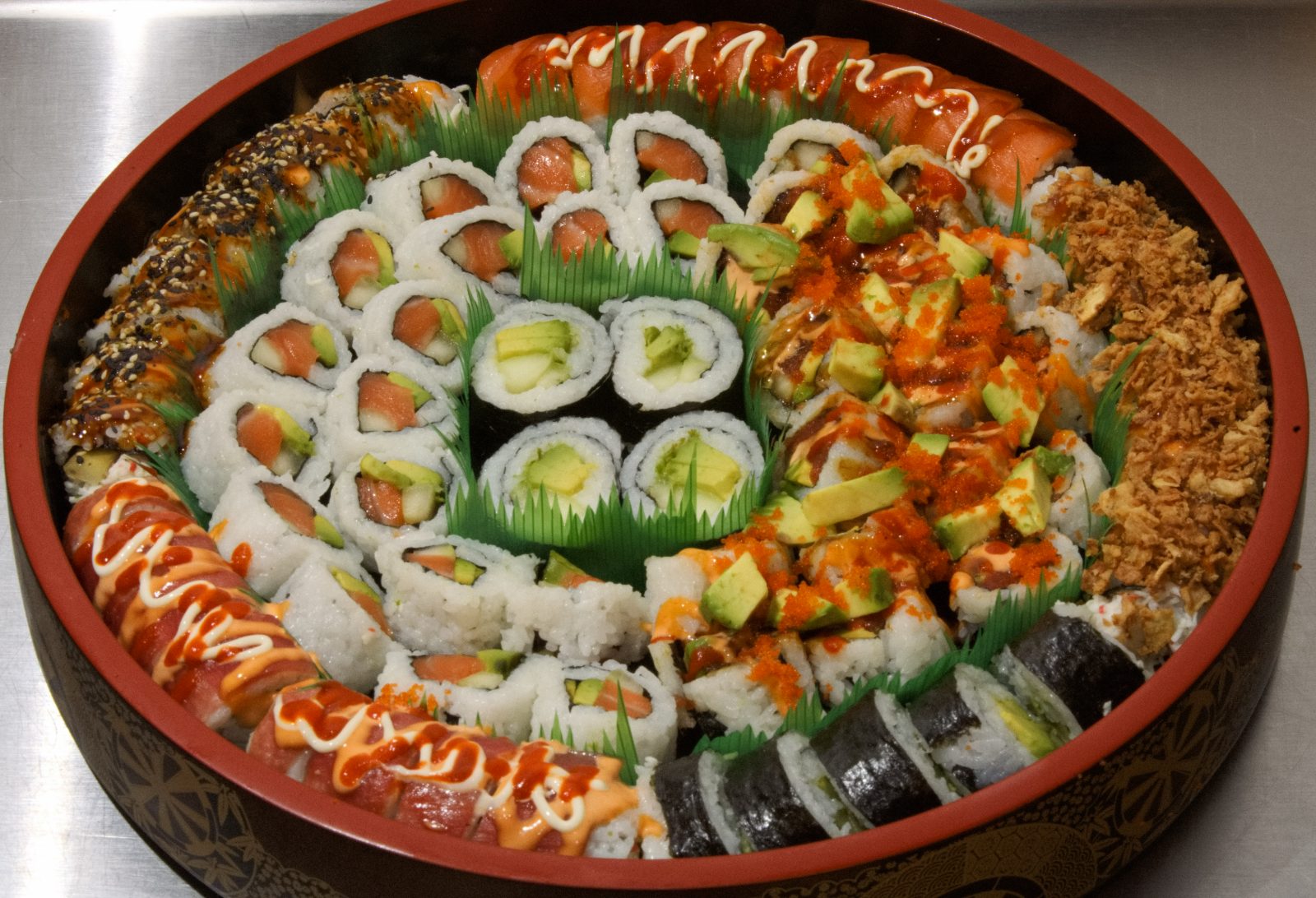 Large round tray, salmon, tuna and dressed rolls